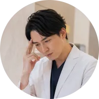 予約数が増えず悩む男性